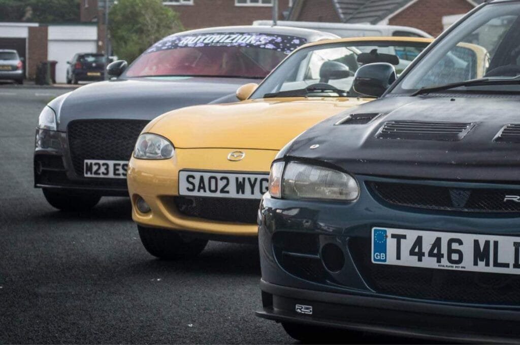 Cars in a line on a car park